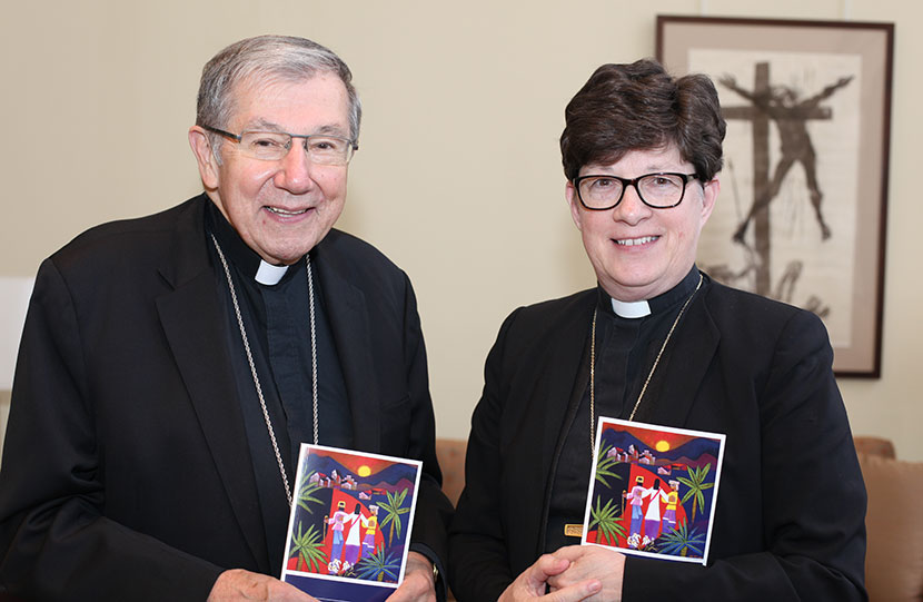 ELCA Presiding Bishop Elizabeth A. Eaton (left) and Bishop Denis J. Madden, auxiliary bishop for the Archdiocese of Baltimore, hold copies of “Declaration on the Way: Church, Ministry and Eucharist” 